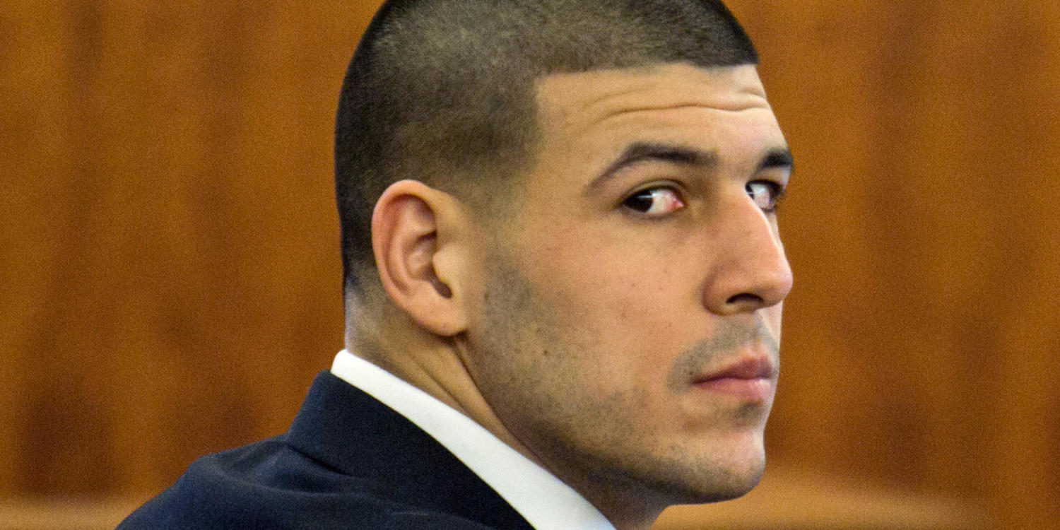 Former NFL player Aaron Hernandez listens during his murder trial at the Bristol County Superior Court in Fall River, Mass., Wednesday, Feb. 18, 2015. Hernandez is accused in the June 17, 2013, killing of Odin Lloyd, who was dating his fiancées sister. (AP Photo/Dominick Reuter, Pool)