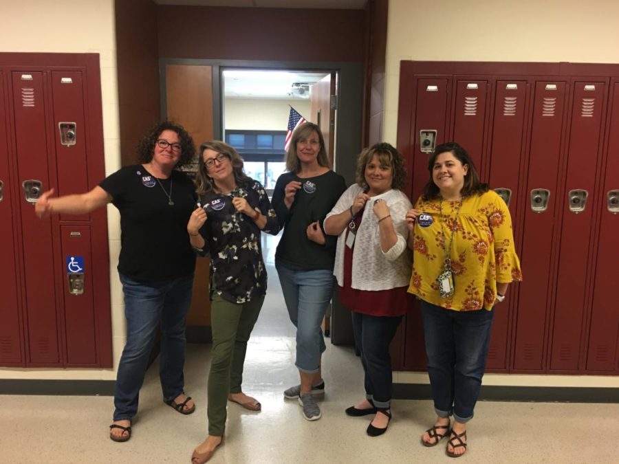 Mrs. Brennan, in charge of the hurricane fundraiser, poses with dressed down English teachers Mrs. Walsh, Ms. Norcross, Mrs. Dymond and Mrs. Dunn