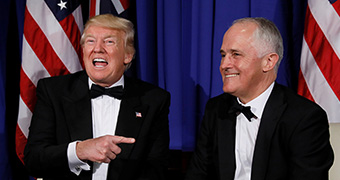 U.S. President Donald Trump (L) and Australias Prime Minister Malcolm Turnbull (R) deliver brief remarks to reporters as they meet ahead of an event commemorating the 75th anniversary of the Battle of the Coral Sea, aboard the USS Intrepid Sea, Air and Space Museum in New York, U.S. May 4, 2017. REUTERS/Jonathan Ernst - RTS158CO