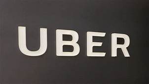 Woman sues Uber and driver