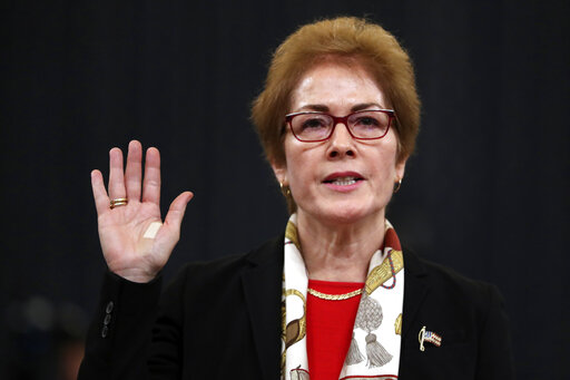 Former U.S. Ambassador to Ukraine Marie Yovanovitch is sworn in to testify to the House Intelligence Committee on Capitol Hill in Washington, Friday, Nov. 15, 2019, during the second public impeachment hearing of President Donald Trumps efforts to tie U.S. aid for Ukraine to investigations of his political opponents. (AP Photo/Andrew Harnik)