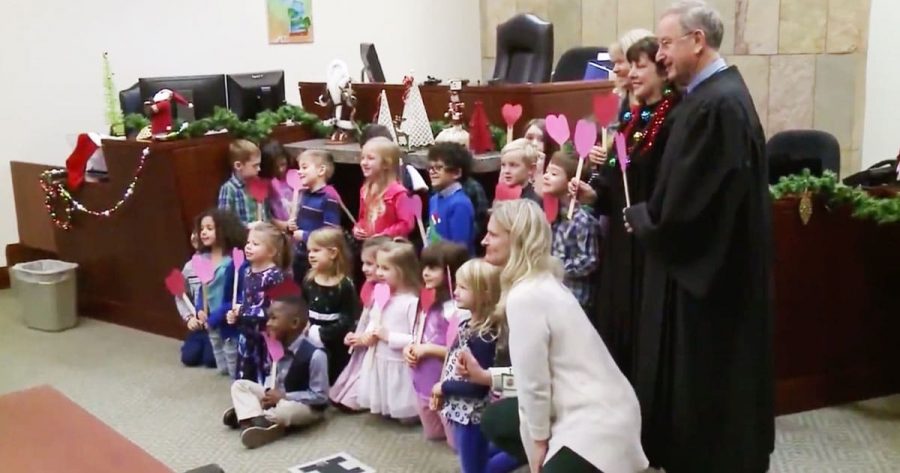 Young boy invited his entire kindergarten class to his adoption