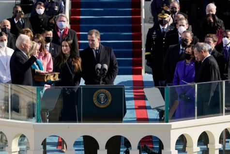 Joe Biden is sworn in as the 46th president of the United States by Chief Justice John Roberts as Jill Biden holds the Bible during the 59th Presidential Inauguration at the U.S. Capitol in Washington, Wednesday, Jan. 20, 2021.(AP Photo/Patrick Semansky, Pool)